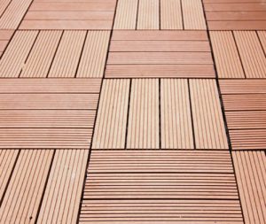 https://accutanrx.com/wp-content/uploads/2022/06/plastic-wood-decking-tiles-500x500-1-300x253.jpg